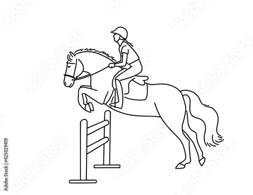 Child and small horse jump over an obstacle