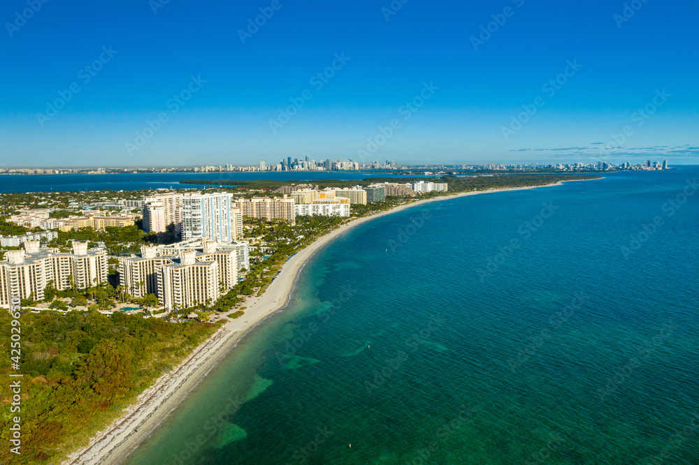 aerial drone view  Key Biscayne beach with downtown Miami skyline in the back