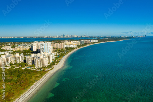aerial drone view  Key Biscayne beach with downtown Miami skyline in the back