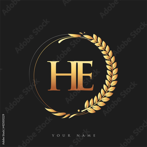 Initial logo letter HE with golden color with laurel and wreath, vector logo for business and company identity.