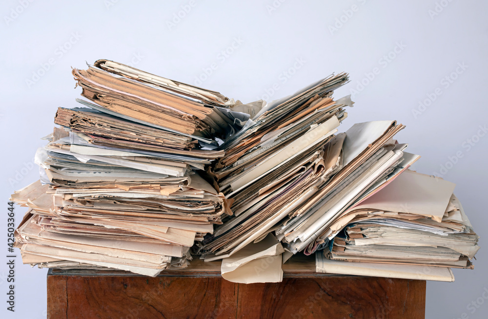 Old, randomly folded paper, as waste paper. Old, randomly folded paper, as waste paper.