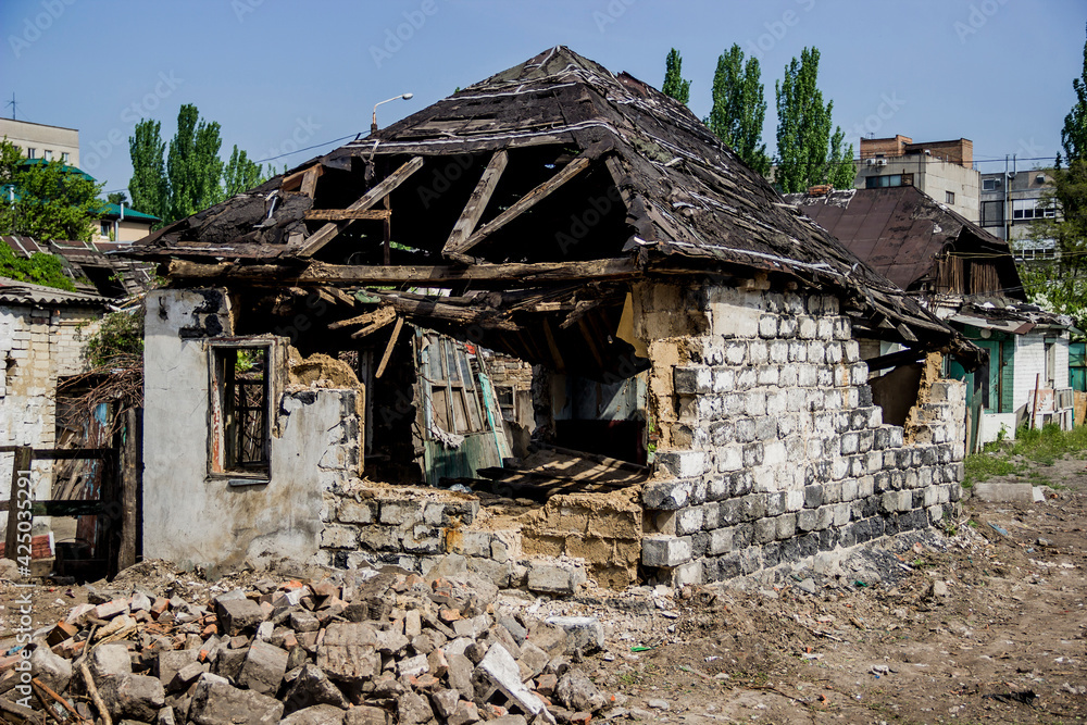 the abandoned damaged small old houses after eviction
