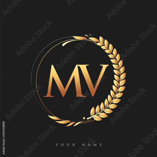 Initial logo letter MV with golden color with laurel and wreath, vector logo for business and company identity. photo