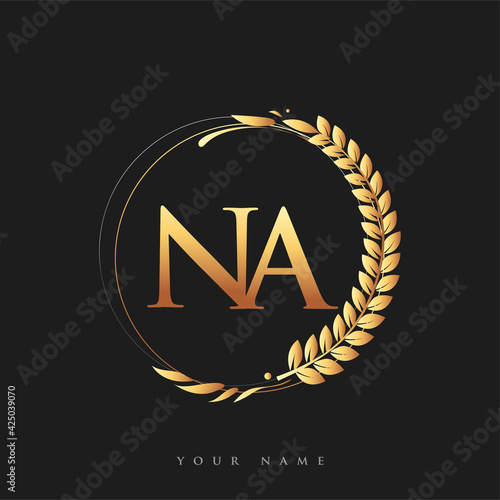 Initial logo letter NA with golden color with laurel and wreath, vector logo for business and company identity.