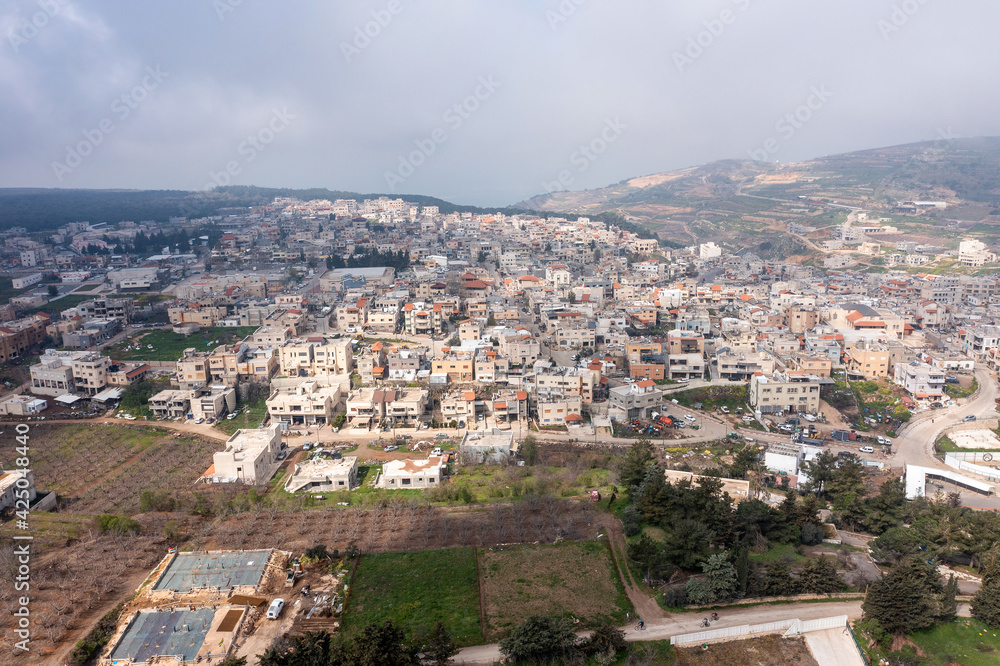 Masade Druze village houses in Israel northern Golan Heights, Aerial view.