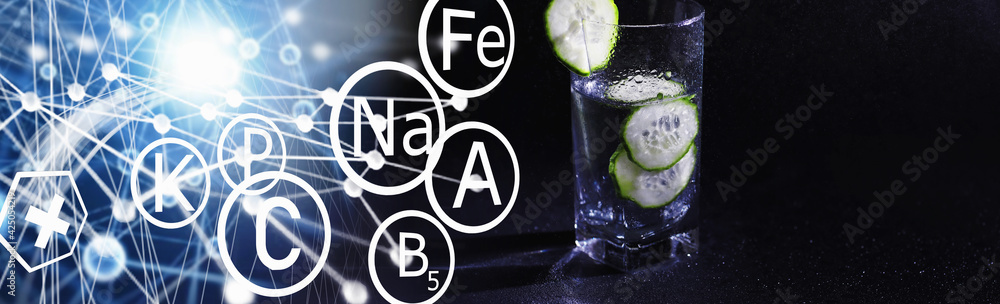 Naklejka premium Cucumber water. Drinking water with fresh cucumber. Mineral water. Healthy, mineral-rich, refreshing water with cucumber.