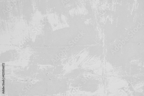 Subtle white washed wall texture background. Cool light soft grey pattern of concrete or cement surface. Abstract template for print or design.