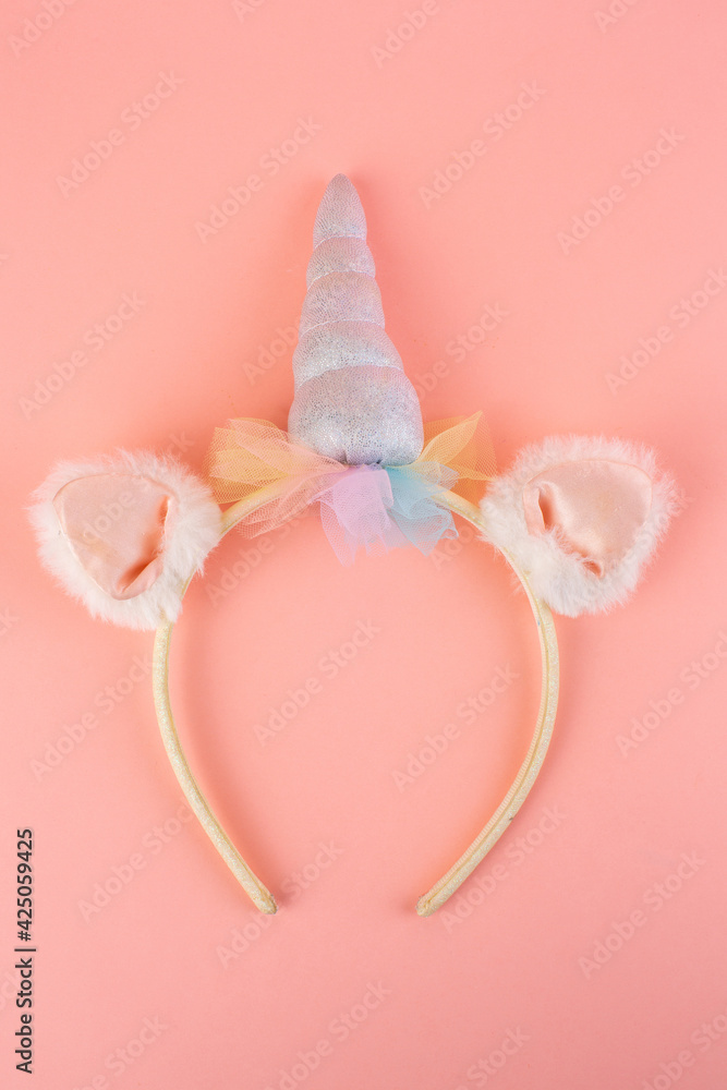 Unicorn band on pink background Unicorn band on pink background