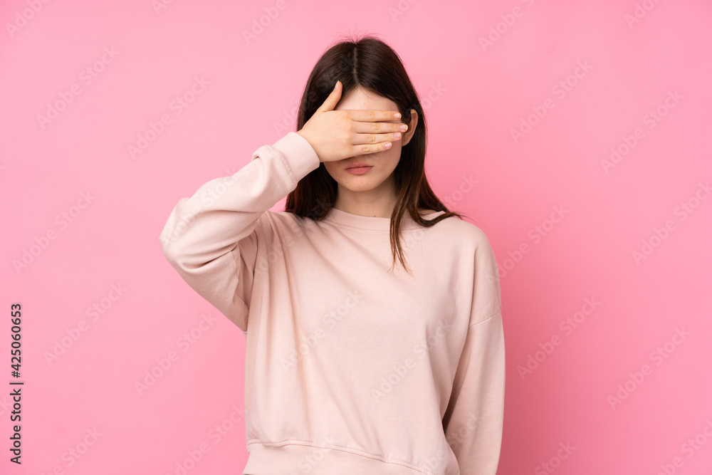 Young Ukrainian teenager girl over isolated pink background covering eyes by hands. Do not want to see something Young Ukrainian teenager girl over isolated pink background covering eyes by hands. Do not want to see something