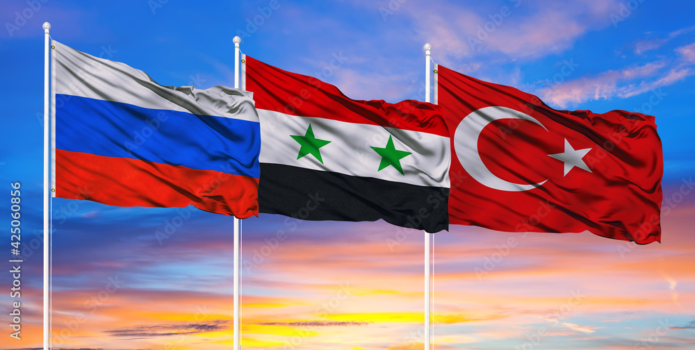 Flags of Russia, Turkey and Syria. The conflict over the Syrian state