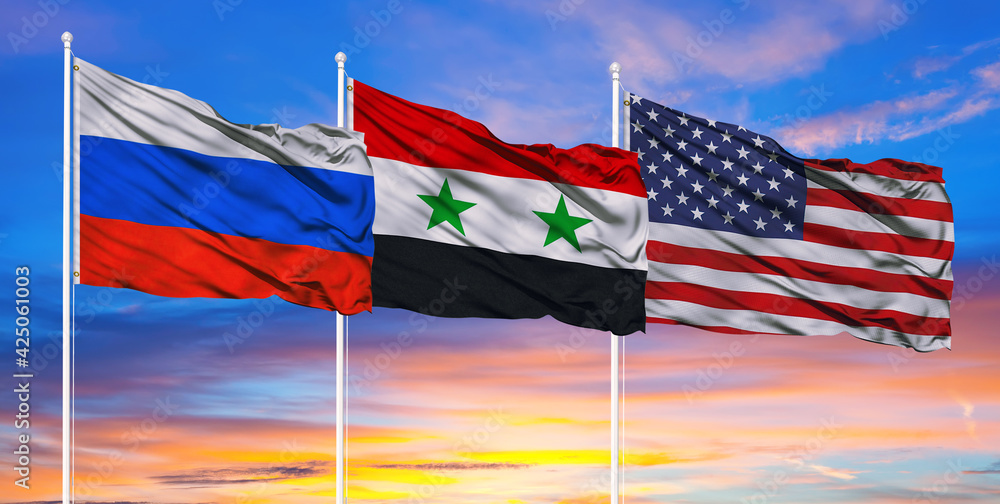 Russia, America, Syria flags. The conflict on Syrian lands