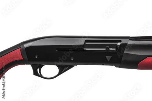 Modern semi-automatic shotgun with a plastic butt isolate on a white back. Weapons for hunting, sports and self-defense. © solidmaks
