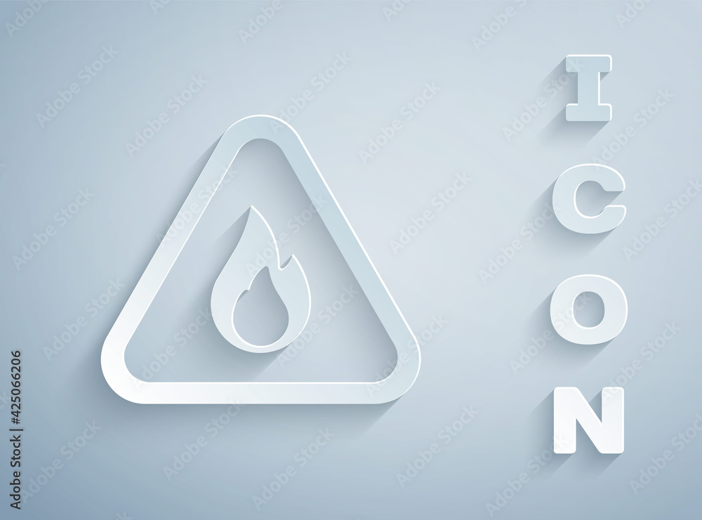Paper cut Fire flame in triangle icon isolated on grey background. Warning sign of flammable product. Paper art style. Vector Paper cut Fire flame in triangle icon isolated on grey background. Warning sign of flammable product. Paper art style. Vector