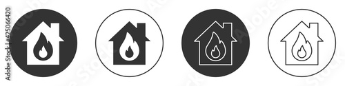Black Fire in burning house icon isolated on white background. Circle button. Vector