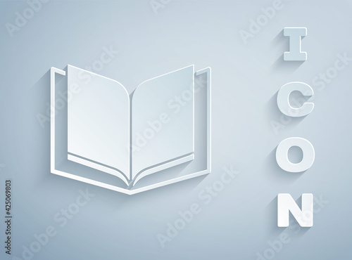 Paper cut Open book icon isolated on grey background. Paper art style. Vector