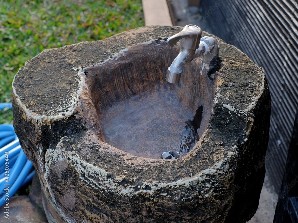 The sink is specially designed from cement material which is shaped to resemble textured natural stone. The sink is specially designed from cement material which is shaped to resemble textured natural stone.