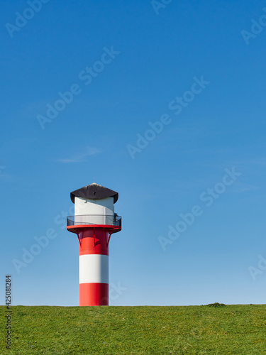 Lighthouse with dike