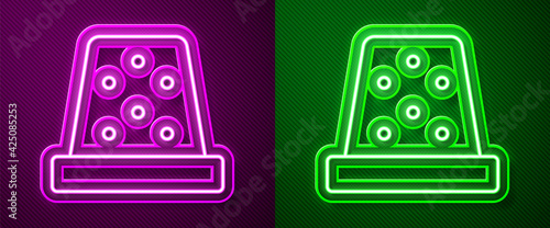 Glowing neon line Thimble for sewing icon isolated on purple and green background. Vector