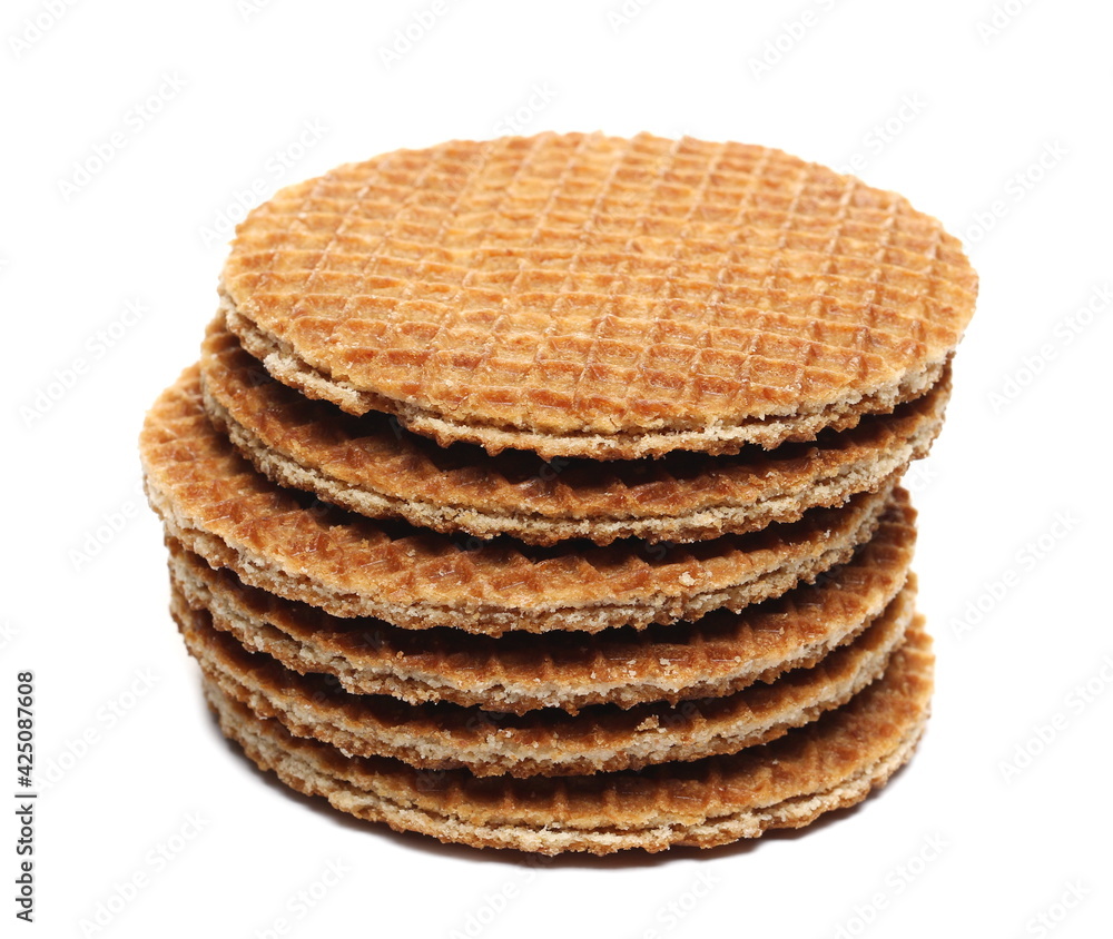 Dutch waffles with honey isolated on white background Dutch waffles with honey isolated on white background