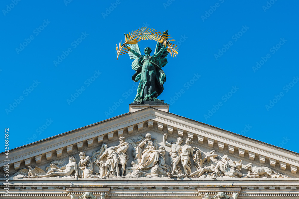 LVIV, UKRAINE - April, 2021: Lviv  Theatre of Opera and Ballet, Lviv opera house. The building is crowned by large bronze statue symbolizing Glory.