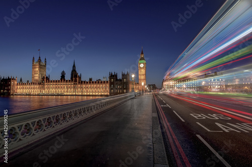 Photography big ben at night with passing bus in blue hour