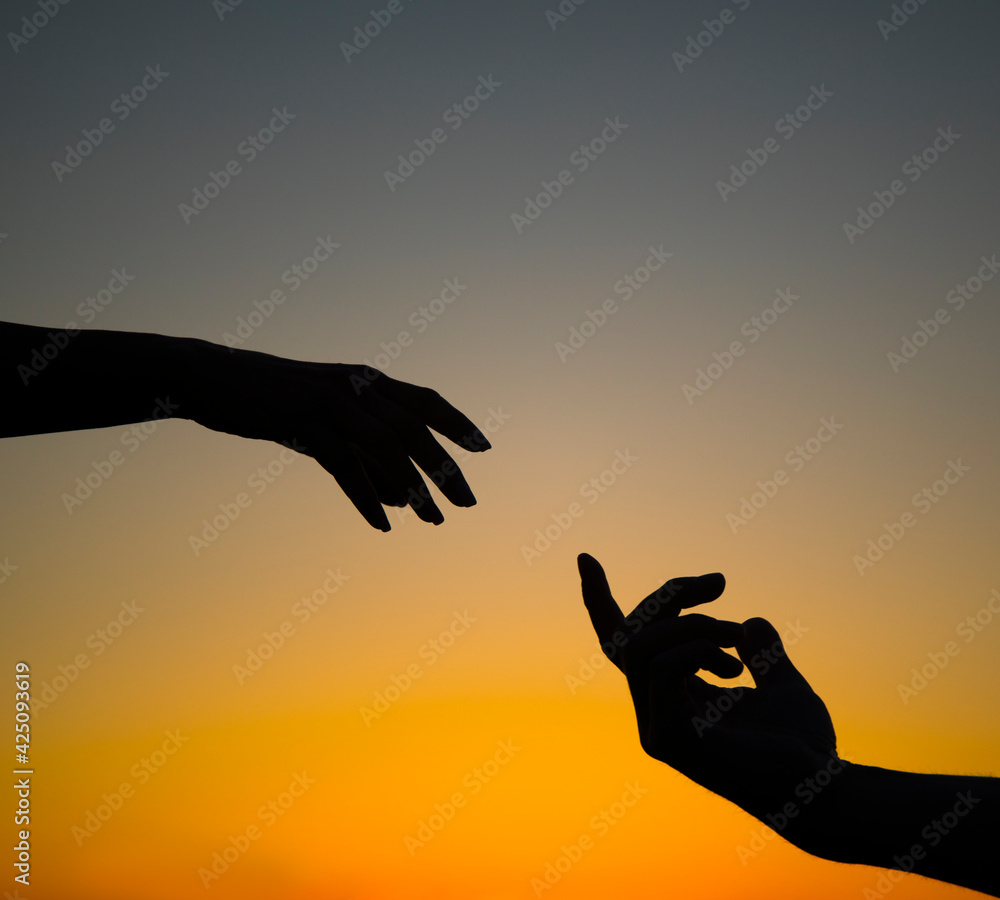 silhouette of helping hand concept and international day of peace