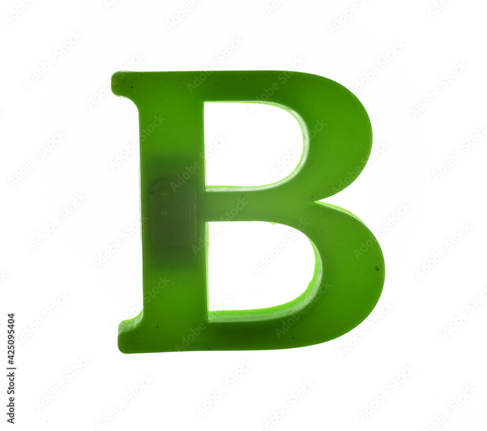 Plastic letter B on magnet isolated on white background, top view Plastic letter B on magnet isolated on white background, top view