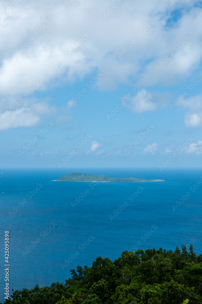 Marianne island, blue sky and Indian ocean, Seychelles