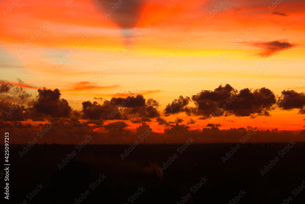 JENEPONTO INDONESIA, March 23, 2021: the sky begins to change color when the sun sets and the clouds take on various forms JENEPONTO INDONESIA, March 23, 2021: the sky begins to change color when the sun sets and the clouds take on various forms