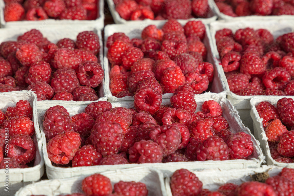 Close up fresh raspberry on retail display Close up fresh raspberry on retail display
