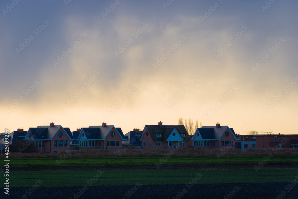Dutch Suburbia near Bleiswijk (The Netherlands). New housing build on old farmland in the polder, encroaching on the last open spaces in the western part of the Netherlands.