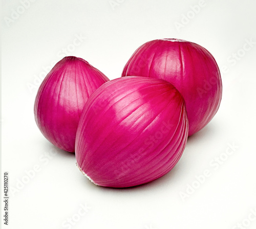 Whole purple onions isolated on white background (Allium cepa)