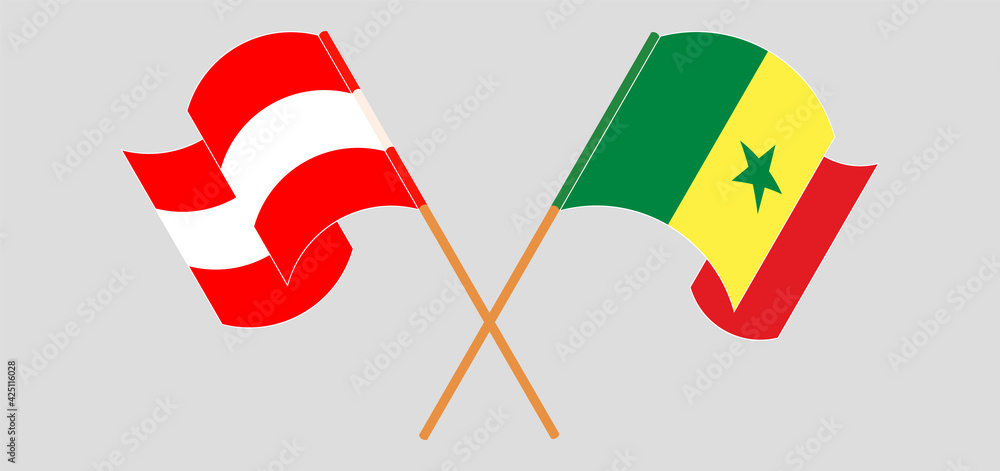 Crossed and waving flags of Austria and Senegal Crossed and waving flags of Austria and Senegal