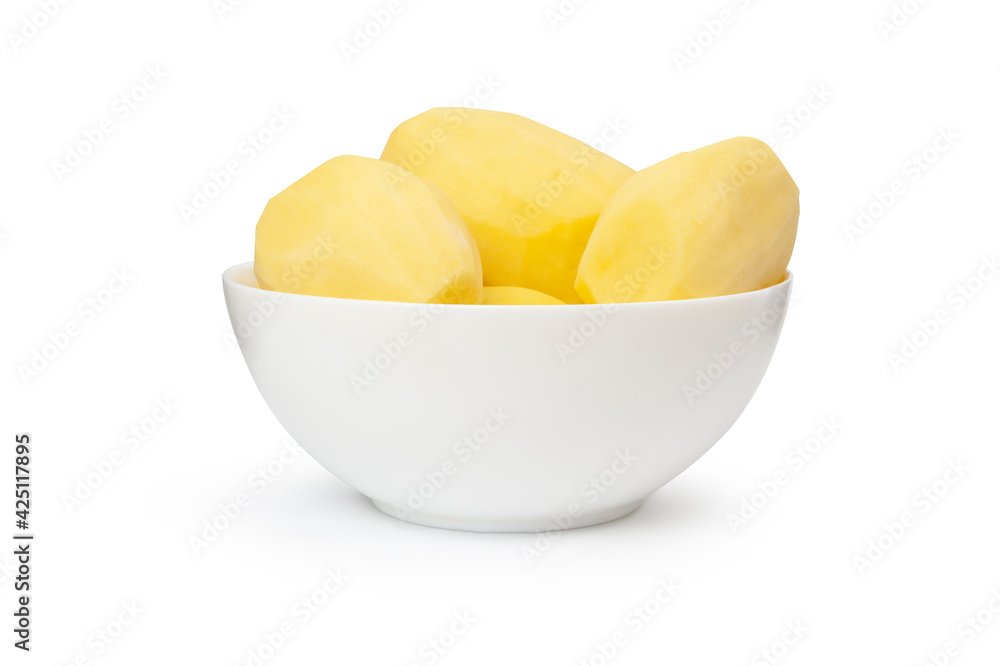 Peeled potatoes in a white bowl isolated on white background Peeled potatoes in a white bowl isolated on white background