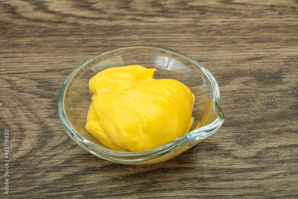 Natural cheese sauce in the bowl Natural cheese sauce in the bowl