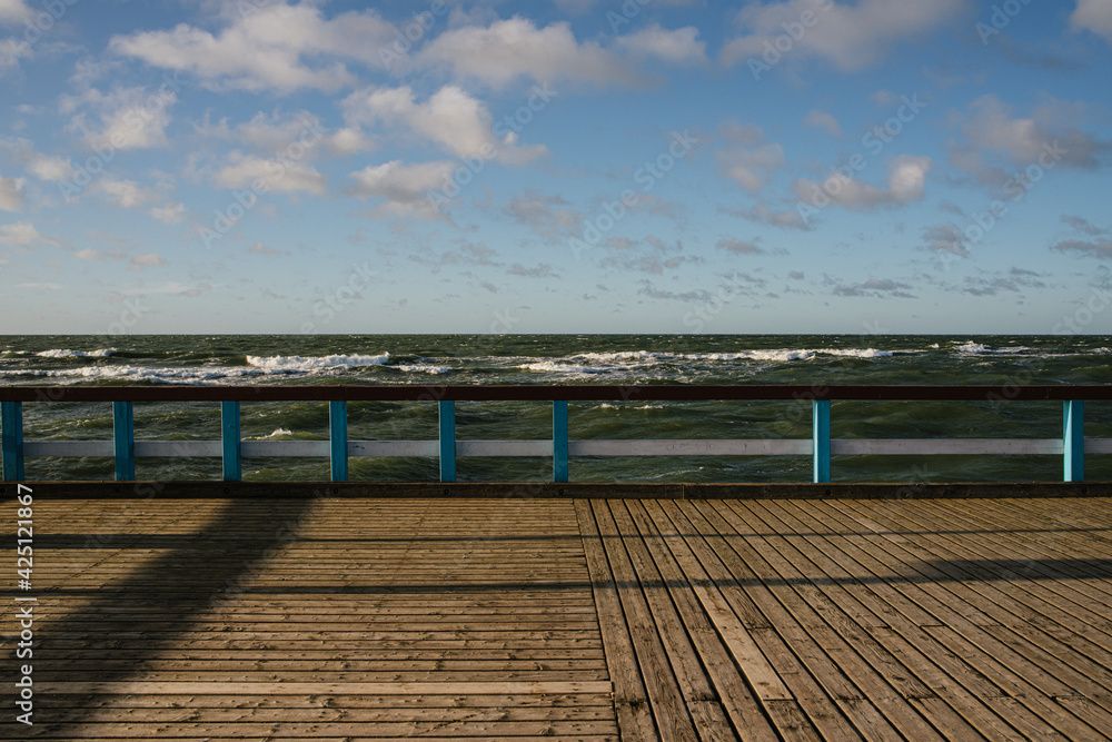 view from the pier to the winter sea