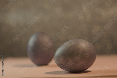 stylish gray marble eggs painted for easter, place for text