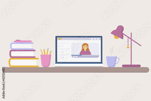 Online training from home. Illustration of a desktop with a computer, desk lamp, books, cup, pen, pencils.