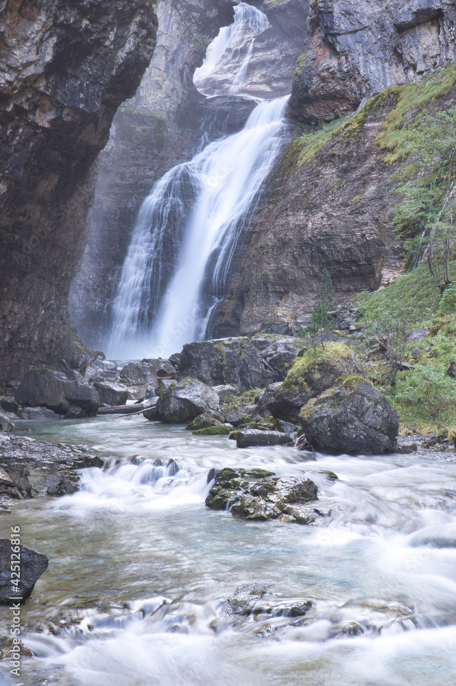 Estrecho waterfall in Ordesa y Monte Perdido National Park, in the Aragonese Pyrenees, located in Huesca, Spain. Estrecho waterfall in Ordesa y Monte Perdido National Park, in the Aragonese Pyrenees, located in Huesca, Spain.