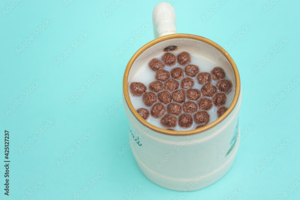 Chocolate cereal with milk. top view. Chocolate cereal with milk. top view.