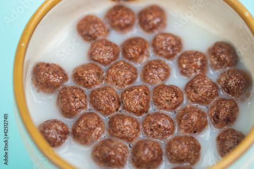 Chocolate cereal with milk. top view.