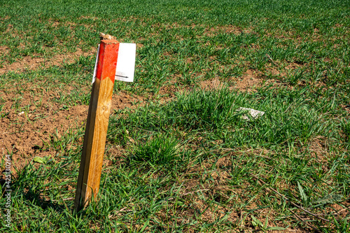 Boundary post and boundary stone in the field