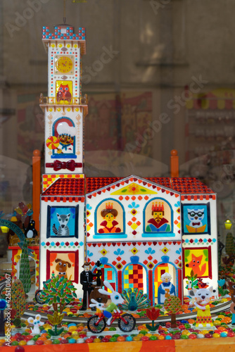 Candy building in the shop window. © Volodymyr