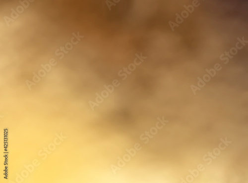 Cloudy gold colors making an abstract background texture in full frame format