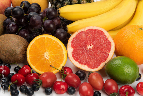 Assorted fresh ripe fruits . Food concept background.