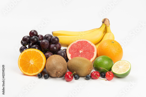 Assorted fresh ripe fruits . Food concept background.
