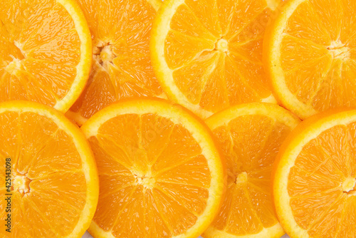 sliced of fresh orange fruits .Food concept background.