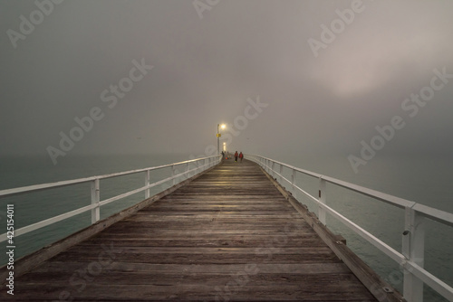 Foggy morning at the Urangan Pier at Hervey Bay, Queensland, Australia photo