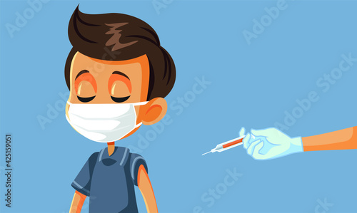 Little Boy Wearing Face Mask Getting Vaccinated