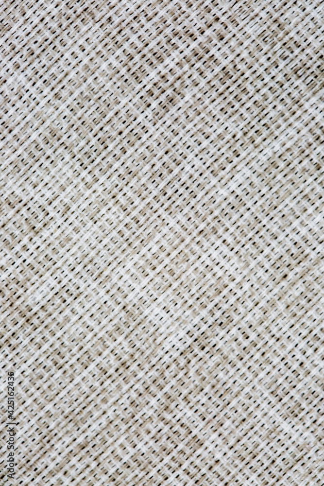Close-up texture of factory fabric, interlacing of threads Close-up texture of factory fabric, interlacing of threads